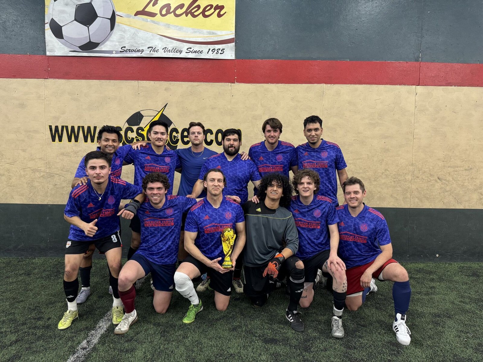 PSC league champions team photo with trophy at the Phoenix Sports Complex