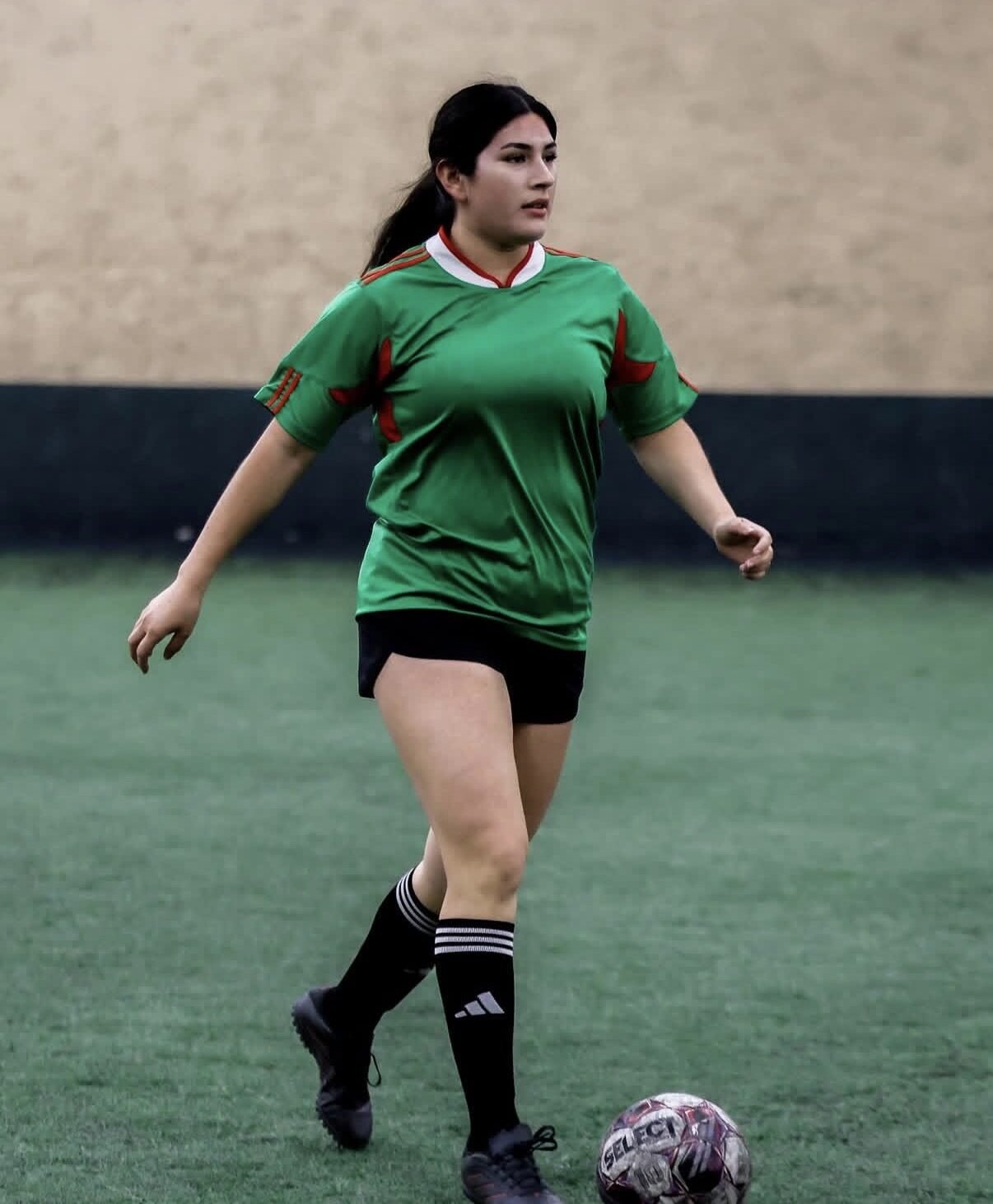 PSC women's league player on indoor field