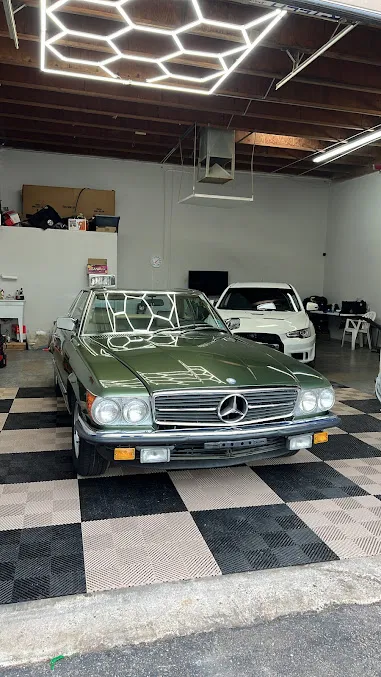 Classic Mercedes coupe under studio lighting