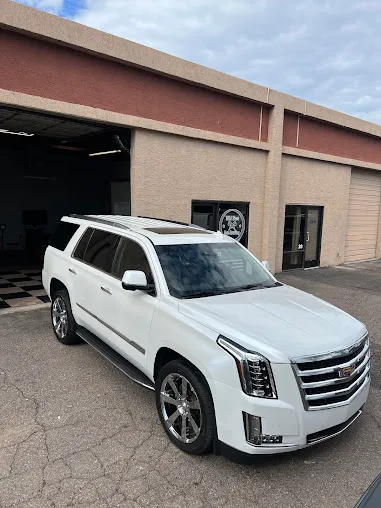 White Cadillac Escalade after a full detail